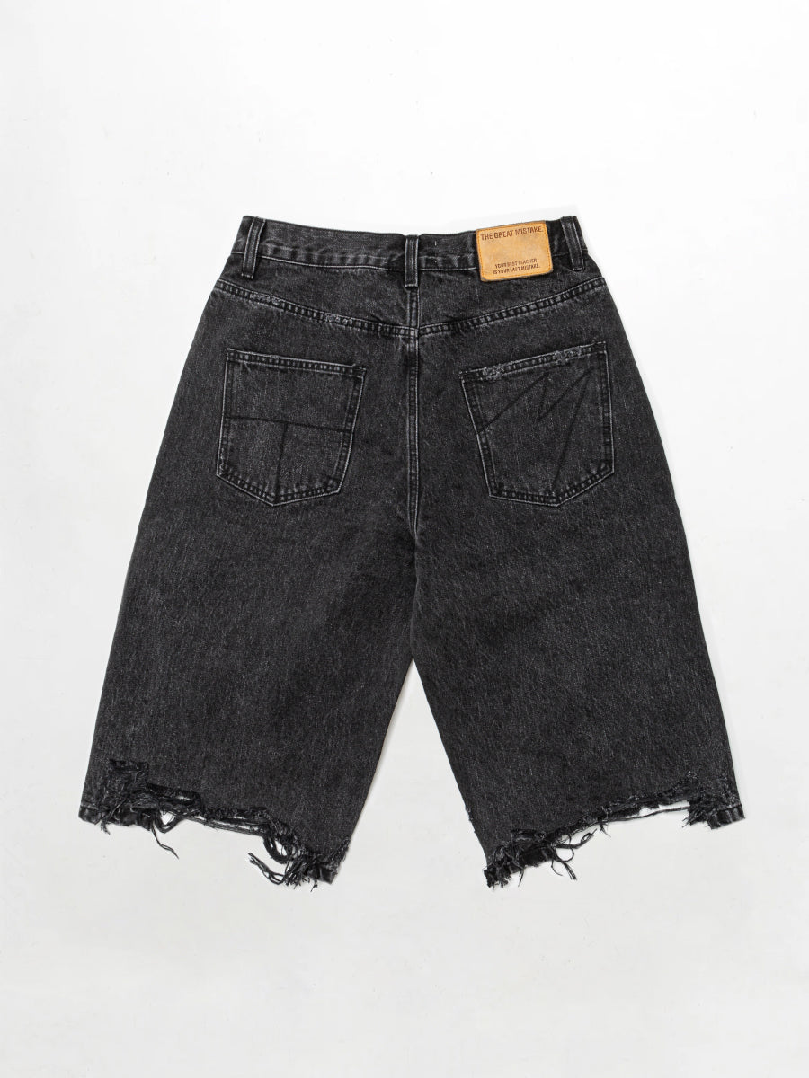 Relaxed distressed denim shorts