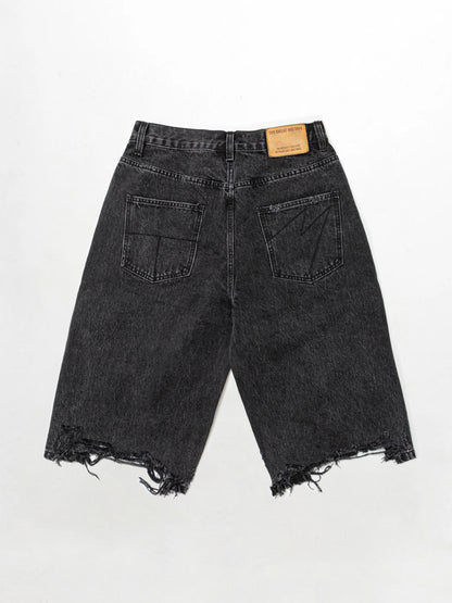 Relaxed distressed denim shorts